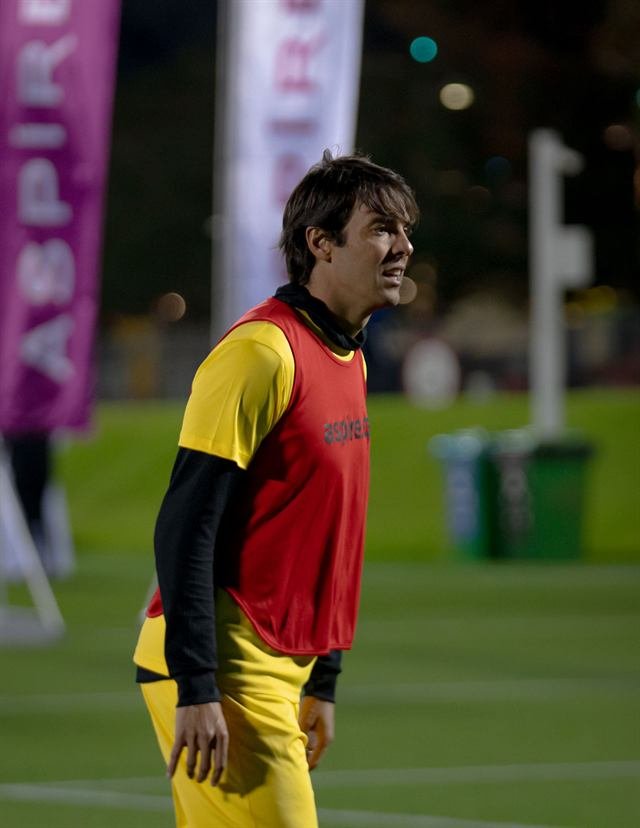 Kaká in a training bib during a night session on the Aspire training pitch ahead of Match for Hope in Doha